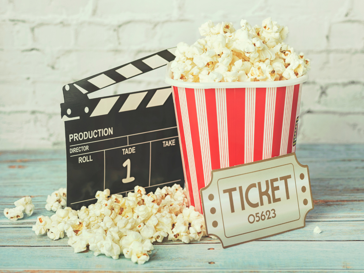 Box of popcorn and production clapboard