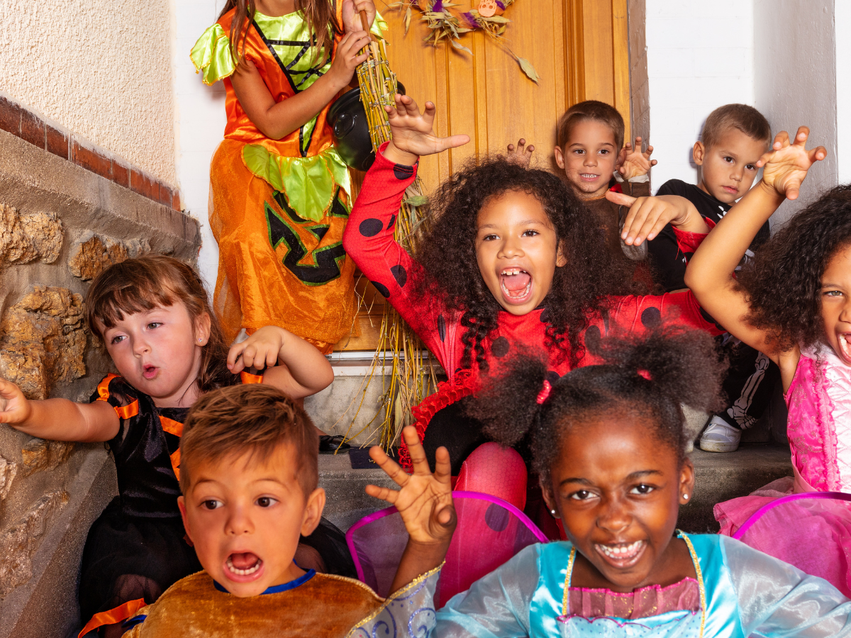 Children in Halloween costumes making a variety of silly and/or scary faces!