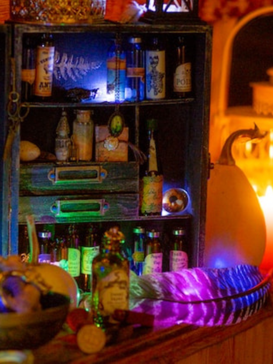 A multi-colored apothecary shelf glows menacingly.