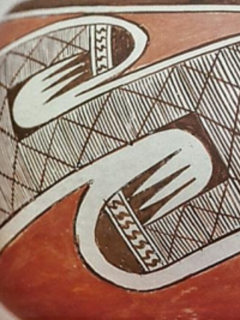 closeup of a clay red, white, and black Zuni olla by Daisy Nampeyo