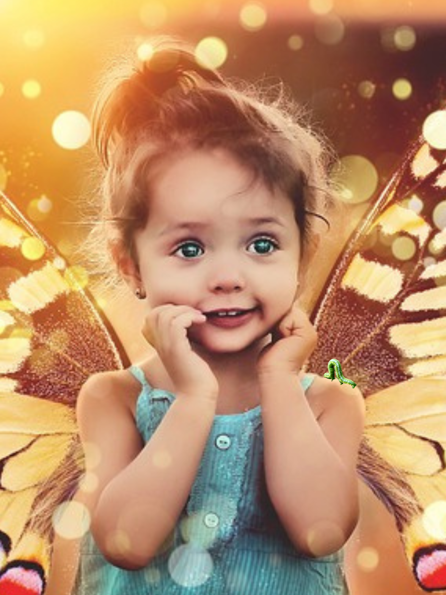 Awestruck toddler, eyes filled with wonder, wearing butterfly wings.